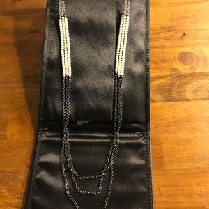 Long white, silver, and navy necklace